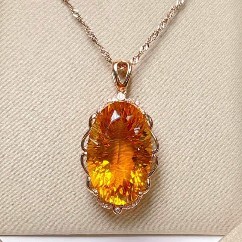 14k Gold 19.02 Ctw Natural Citrine & Diamond Pendant( Without Chain ): Ref:231173221 // gold content:14k gold // main gemstone:citrine // shape:oval // carat weight:18. 95ct // color:yellow // treatment:natural // // adjacent gemstone 2 : diamond // number of stones:22
