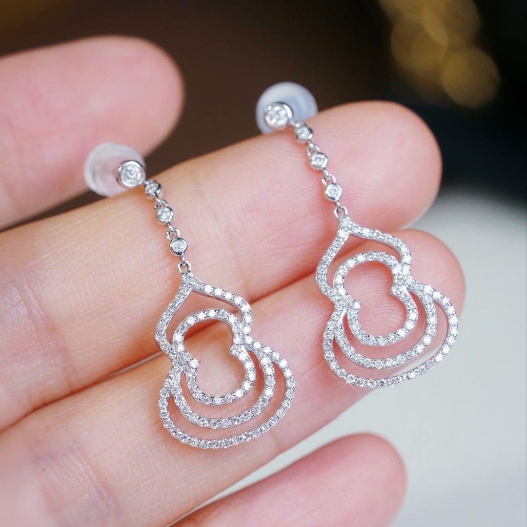 14k Gold 0.60 Ct Natural H Diamond Earrings: Ref:231173246 // gold content:14k gold // main gemstone:diamond // shape:round // carat weight:0. 60ct // clarity grade:vs-si // color:h // treatment:natural // cut grade:g // Condition: New Low