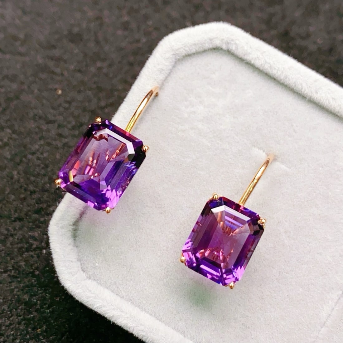 14k Gold 9.95 Ct Natural Amethyst Earrings: Ref:231174022 // gold content:14k gold // main gemstone:amethyst // shape:octagonal // carat weight:9. 95ct // color:purple // treatment:natural // Condition: New Low Estimate: 1400.00 High Estimate: