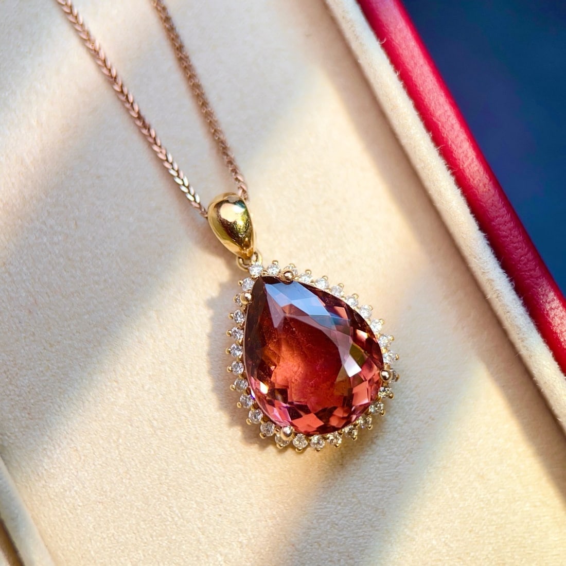 14k Gold 6.0 Ctw Natural Tourmaline & Diamond Pendant( Without Chain ): Ref:231174057 // gold content:14k gold // main gemstone:tourmaline // shape:pear // carat weight:5. 7ct // color:red // treatment:natural // // adjacent gemstone 2 : diamond // number of stones:30 //