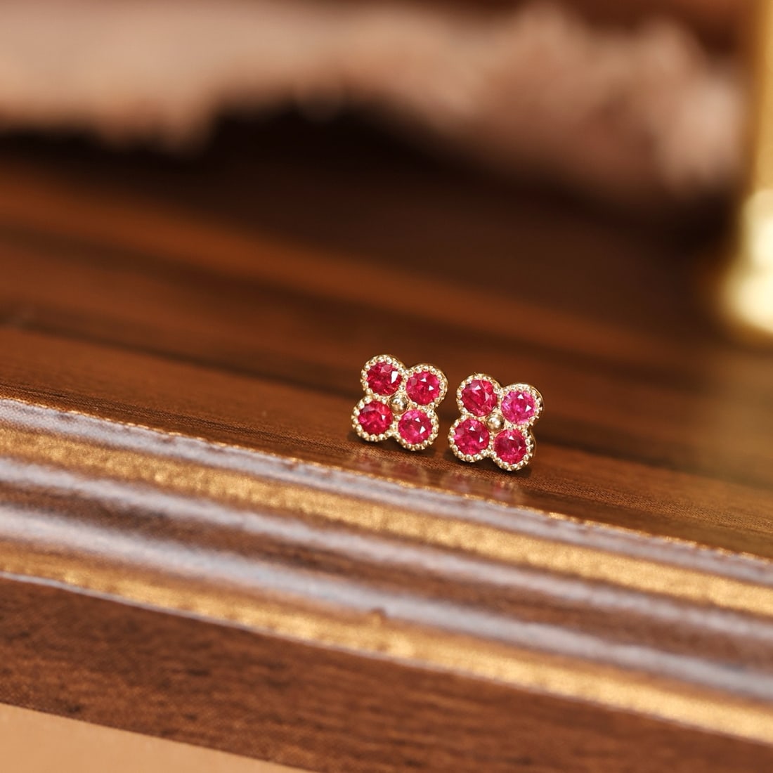 14k Gold 0.27 Ct Natural Ruby Earrings: Ref:231174096 // gold content:14k gold // main gemstone:ruby // shape:round // carat weight:0. 27ct // color:red // treatment:natural // cut grade:g // Condition: New Low Estimate: 1300.00 High