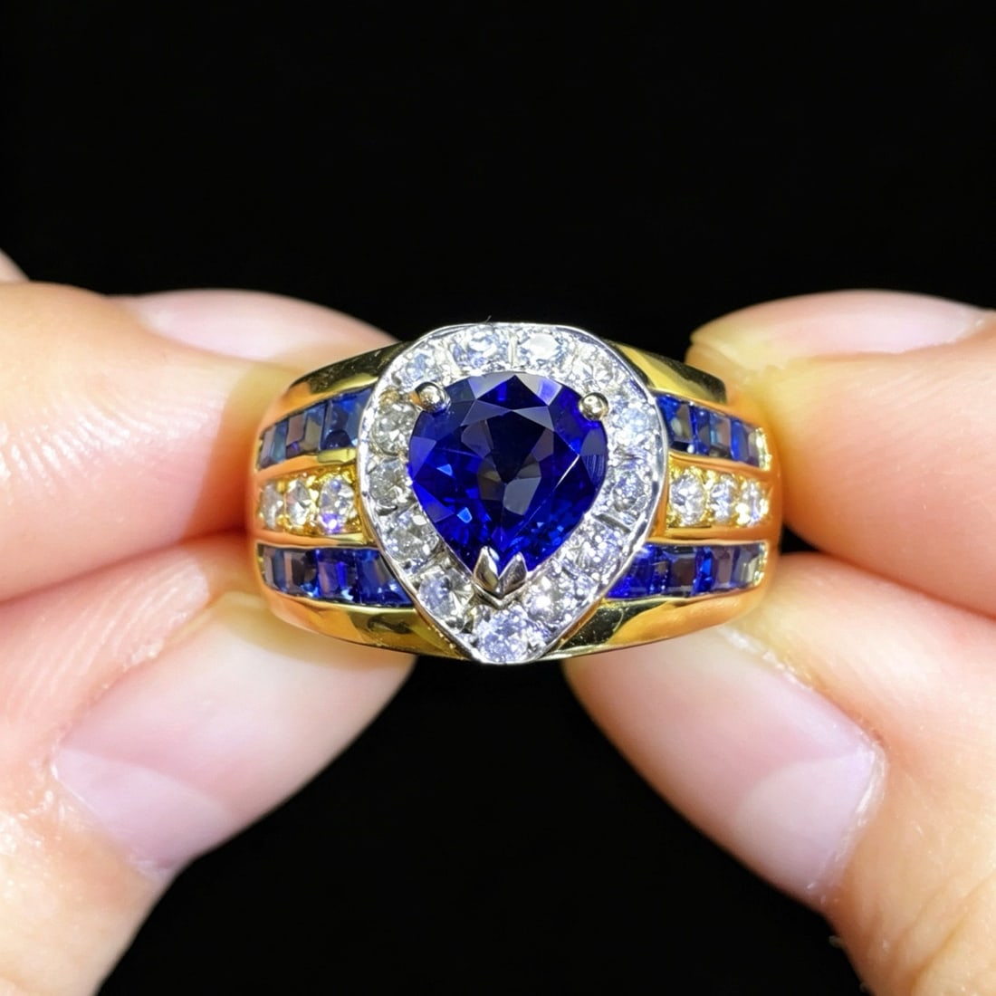 14k Gold 2.23 Ctw Natural Sapphire & Diamond Ring: Ref:231174090 // gold content:14k gold // ring size:7. 25us // // main gemstone:sapphire // shape:pear // carat weight:1. 71ct // color:blue // treatment:natural // // adjacent gemstone 2 : diamond