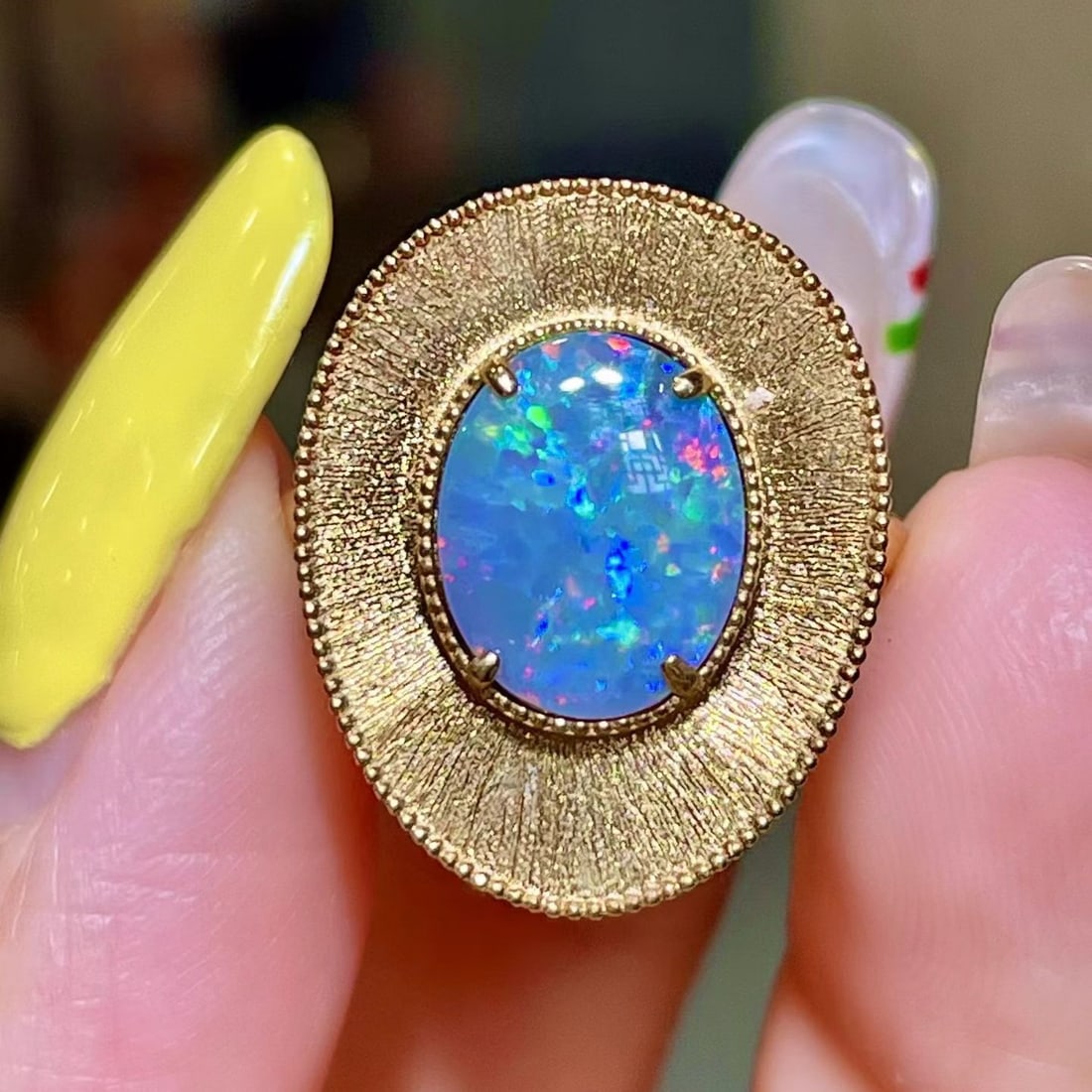 14k Gold 1.55 Ct Natural Opal Ring: Ref:231174167 // gold content:14k gold // ring size:7. 25us // // main gemstone:opal // shape:oval // carat weight:1. 55ct // color:color // treatment:natural // Condition: New Low Estimate: 7300.00