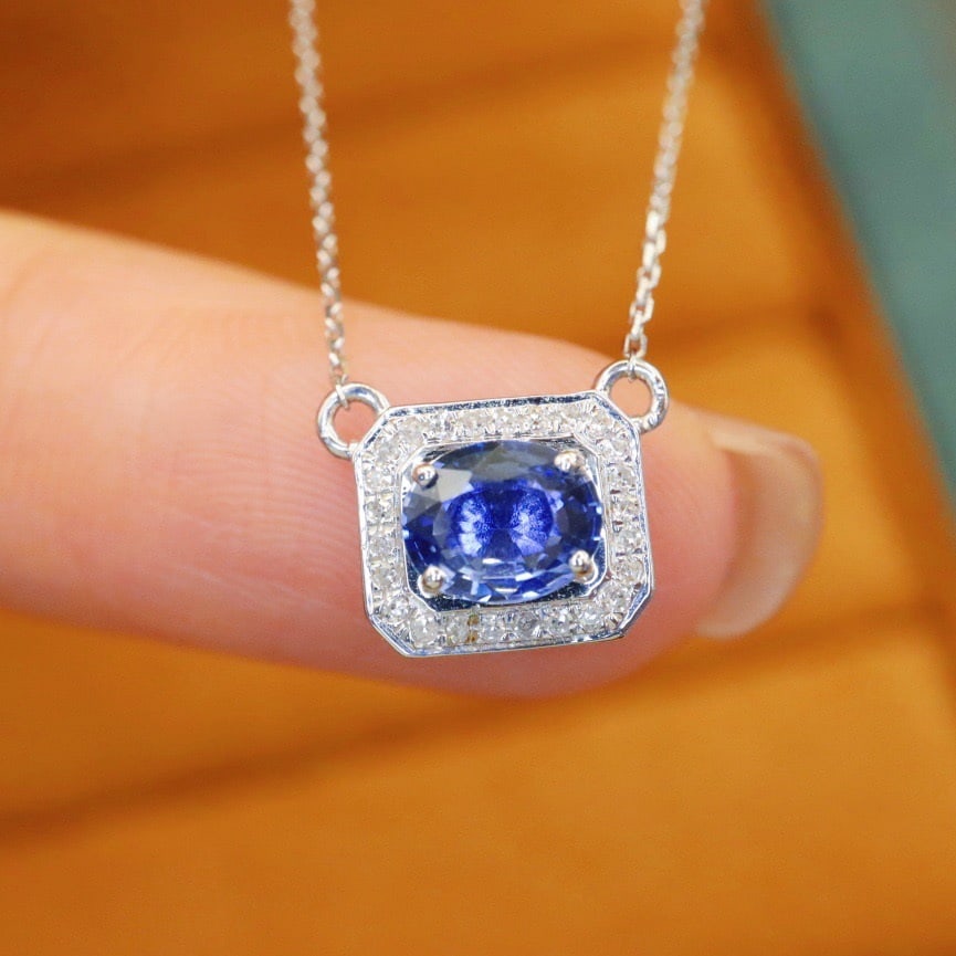 14k Gold 0.92 Ctw Natural Sapphire & Diamond Necklace: Ref:231174207 // gold content:14k gold // main gemstone:sapphire // shape:oval // carat weight:0. 85ct // color:blue // treatment:natural // // adjacent gemstone 2 : diamond // number of stones:25 //