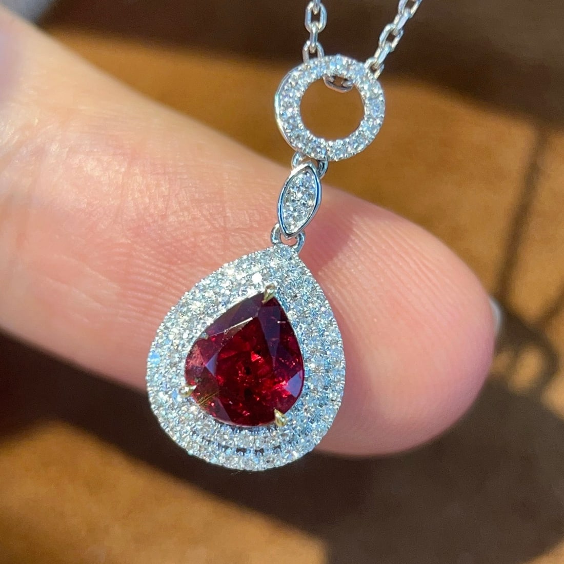 14k Gold 1.04 Ctw Natural Ruby & Diamond Pendant( Without Chain ): Ref:231174279 // gold content:14k gold // main gemstone:ruby // shape:pear // carat weight:0. 85ct // color:red // treatment:natural // // adjacent gemstone 2 : diamond // shape:round // carat