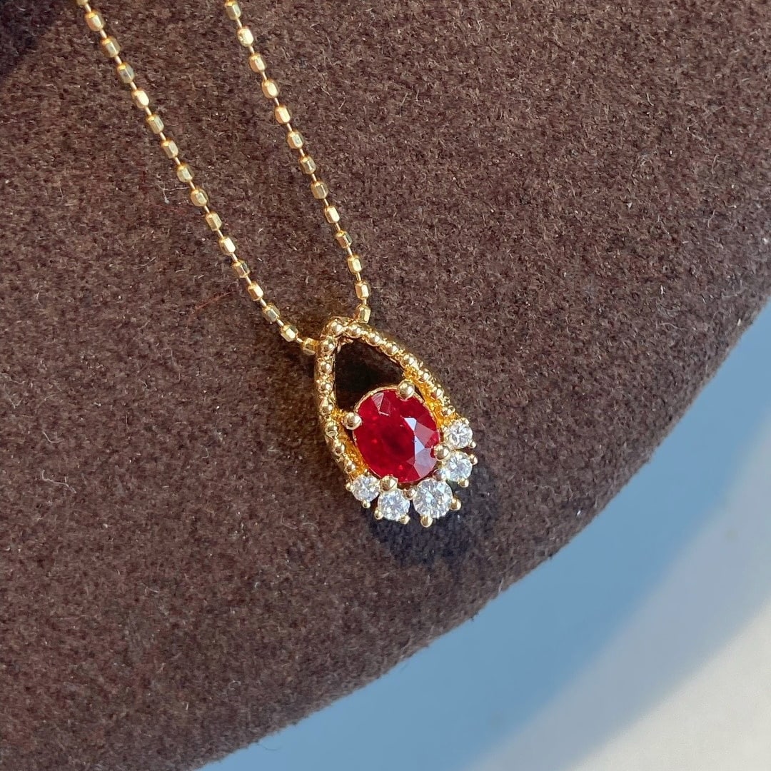 14k Gold 0.45 Ct Natural Ruby & Diamond Pendant( Without Chain ): Ref:231174335 // gold content:14k gold // main gemstone:ruby // shape:oval // carat weight:0. 45ct // color:red // treatment:natural // // adjacent gemstone 2 : diamond // shape:round // clarity