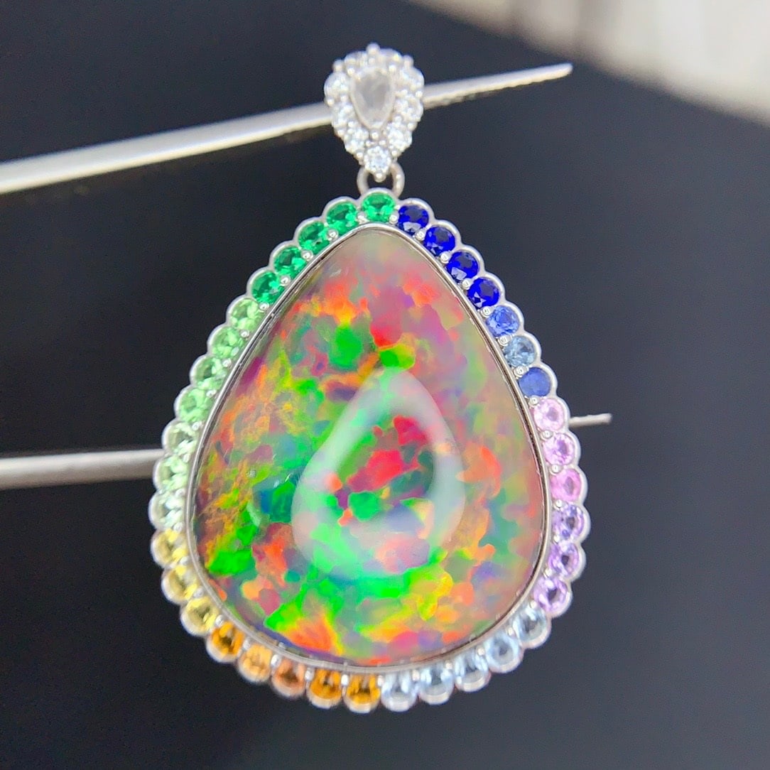 14k Gold 17.9 Ct Natural Opal & Coloured Gemstone Pendant( Without Chain ): Ref:231174332 // gold content:14k gold // main gemstone:opal // shape:pear // carat weight:17. 9ct // color:color // treatment:natural // // adjacent gemstone 2 : coloured gemstone // shape:round //