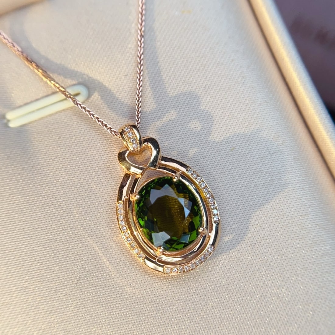 14k Gold 4.53 Ctw Natural Tourmaline & Diamond Pendant( Without Chain ): Ref:231174378 // gold content:14k gold // main gemstone:tourmaline // shape:oval // carat weight:4. 4ct // color:green // treatment:natural // // adjacent gemstone 2 : diamond // number of stones:33