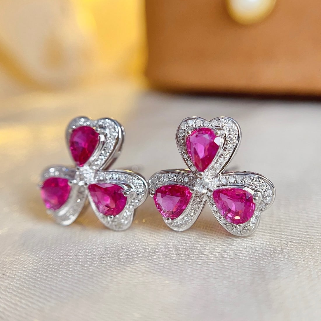 14k Gold 2.50 Ct Natural Ruby & Diamond Earrings: Ref:231174407 // gold content:14k gold // main gemstone:ruby // shape:pear // carat weight:2. 50ct // color:red // treatment:natural // // adjacent gemstone 2 : diamond // number of stones:128 //