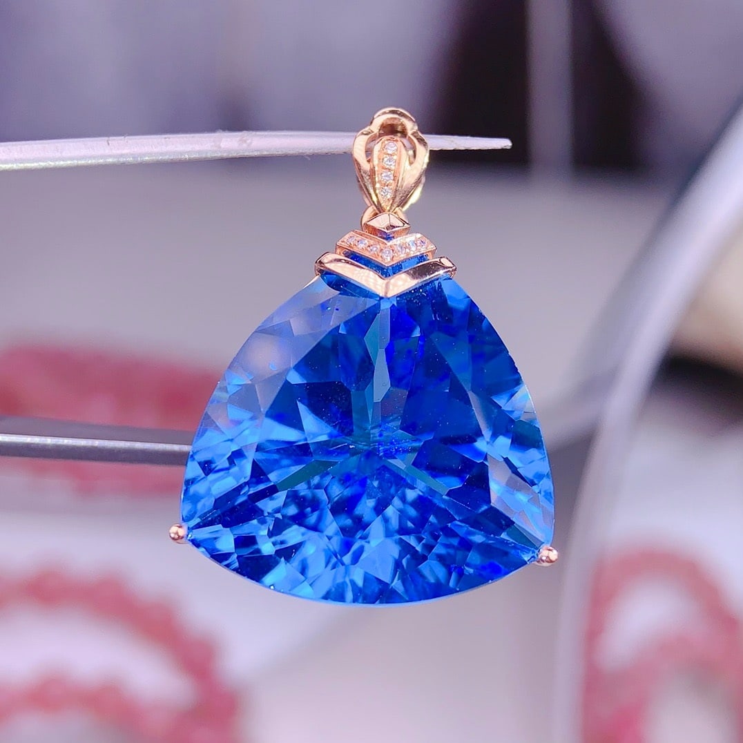 14k Gold 39.5 Ct Natural Topaz & Diamond Pendant( Without Chain ): Ref:231174415 // gold content:14k gold // main gemstone:topaz // shape:triangle // carat weight:39. 5ct // color:blue // treatment:natural // // adjacent gemstone 2 : diamond // shape:round //
