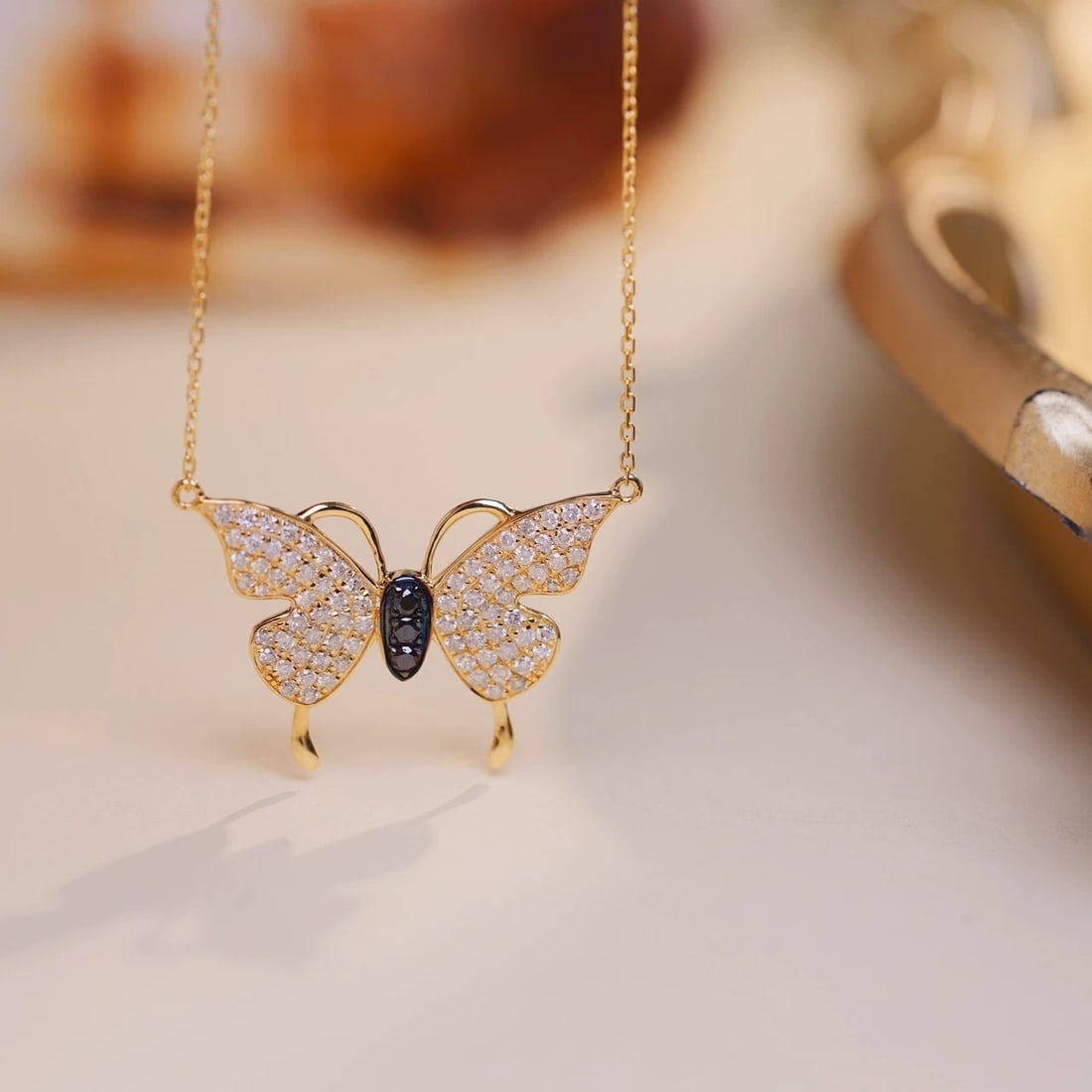 14k Gold 0.6 Ctw Natural H Diamond & Black Diamond Butterfly Necklace: Ref:230947019 // gold content:14k gold // main gemstone:diamond // shape:round // carat weight:0. 6ct // clarity grade:vs-si // color:white & black // treatment:natural // cut grade:g // Condition: