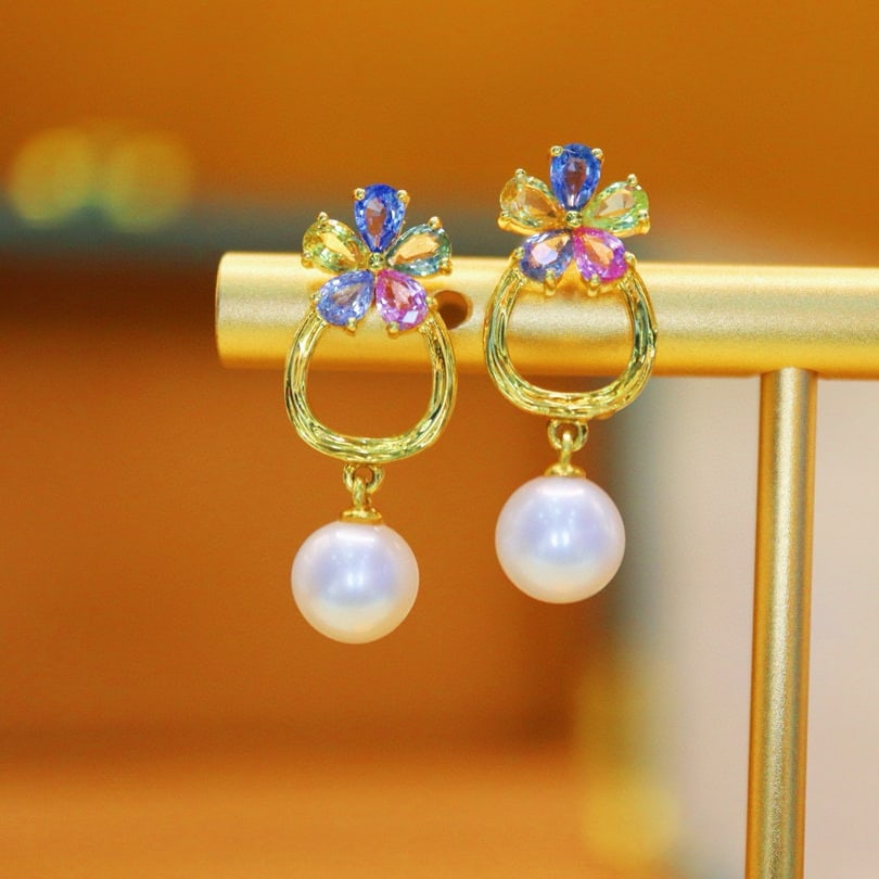 14k Gold 1.25 Ct Natural Sapphire & Pearl Earrings: Ref:230947038 // gold content:14k gold // main gemstone:sapphire // shape:pear // carat weight:1. 25ct // color:color // treatment:natural // // adjacent gemstone 2 : pearl // number of stones:2 //