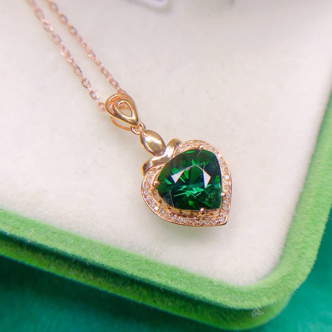 14k Gold 3.20 Ctw Natural Tourmaline & Diamond Pendant( Without Chain ): Ref:230947044 // gold content:14k gold // main gemstone:tourmaline // shape:pear // carat weight:3. 1ct // color:green // treatment:natural // // adjacent gemstone 2 : diamond // number of stones:35 /