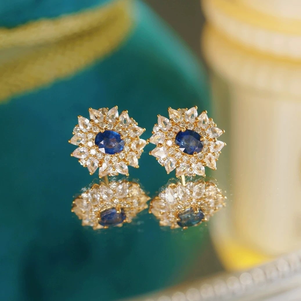14k Gold 3.16 Ctw Natural Sapphire & Sapphire Earrings: Ref:230947055 // gold content:14k gold // main gemstone:sapphire // shape:oval // carat weight:1. 16ct // color:blue // treatment:natural // // adjacent gemstone 2 : sapphire // shape:pear // carat