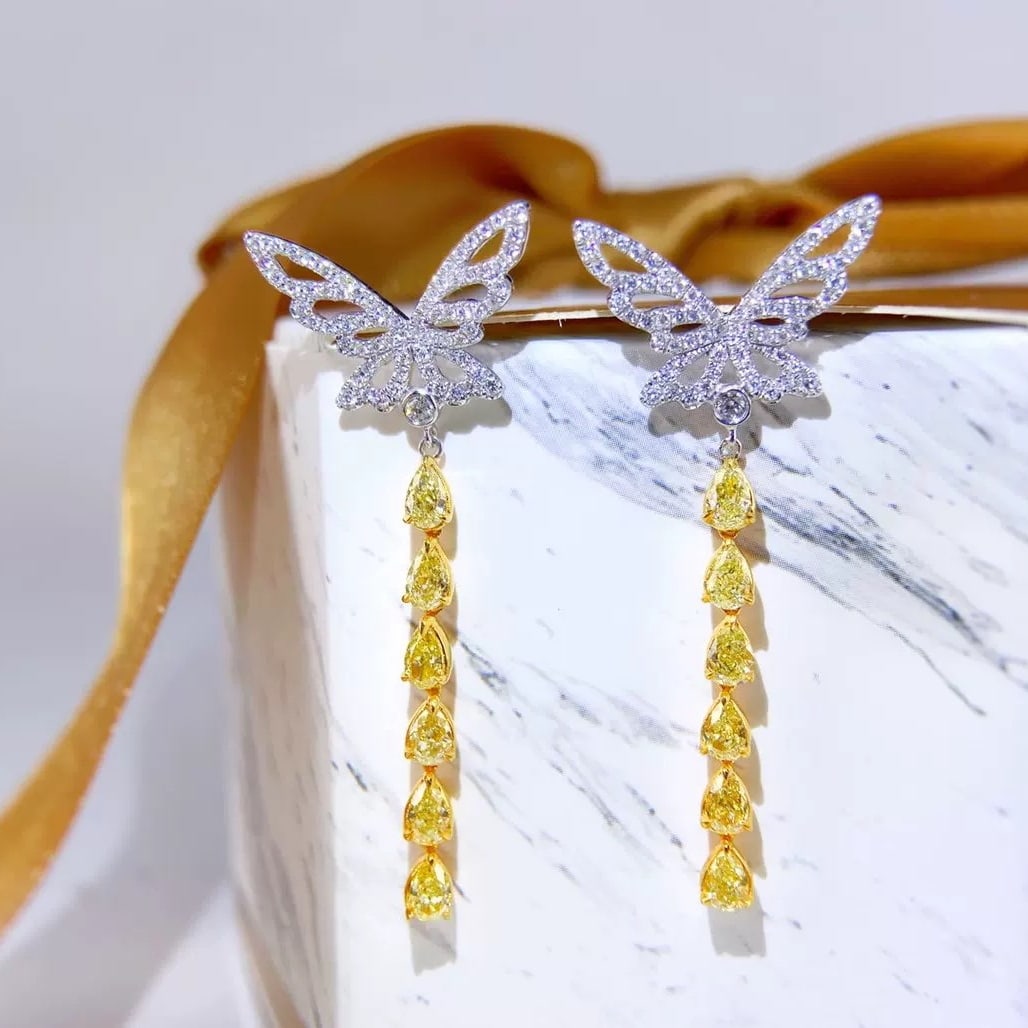 14k Gold 2.18 Ctw Natural Yellow Diamond & Diamond Earrings: Ref:230947066 // gold content:14k gold // main gemstone:yellow diamond // shape:pear // carat weight:1. 6ct // color:yellow // treatment:natural // // adjacent gemstone 2 : diamond // shape:round // c