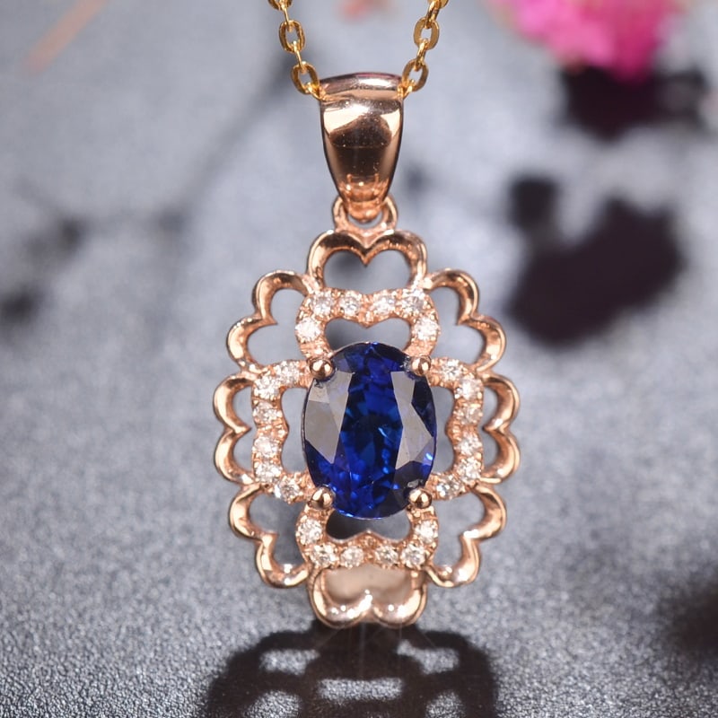 14k Gold 1.17 Ctw Natural Sapphire & Diamond Pendant( Without Chain ): Ref:230947102 // gold content:14k gold // main gemstone:sapphire // shape:oval // carat weight:1. 10ct // color:royal blue // treatment:natural // // adjacent gemstone 2 : diamond // shape:round // ca