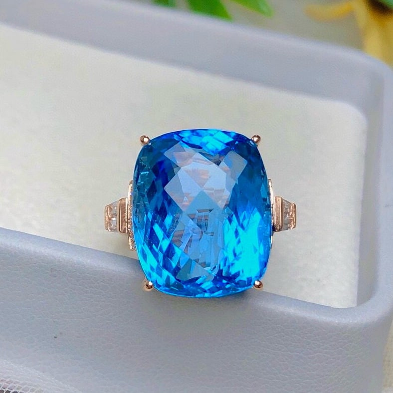 14k Gold 23.3 Ct Natural Topaz & Diamond & Sapphire Ring: Ref:230947129 // gold content:14k gold // ring size:7. 25us // // main gemstone:topaz // shape:cushion // carat weight:23. 3ct // color:swiss blue // treatment:natural // // adjacent gemstone 2 :