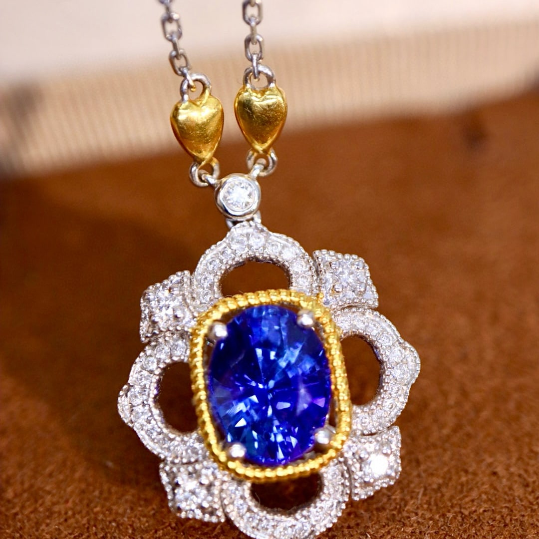 14k Gold 2.44 Ctw Vivid Blue Natural Sapphire & Diamond Necklace: Ref:230947130 // gold content:14k gold // main gemstone:sapphire // shape:oval // carat weight:2. 23ct // color:vivid blue // treatment:natural // // adjacent gemstone 2 : diamond // shape:round //