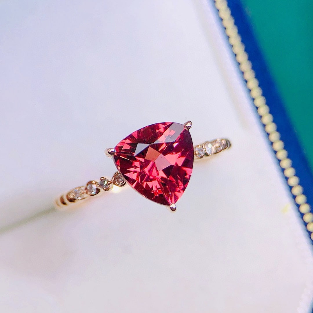 14k Gold 1.79 Ctw Natural Tourmaline & Diamond Ring: Ref:230947137 // gold content:14k gold // ring size:7. 25us // // main gemstone:tourmaline // shape:triangle // carat weight:1. 75ct // color:red // treatment:natural // // adjacent gemstone 2 :
