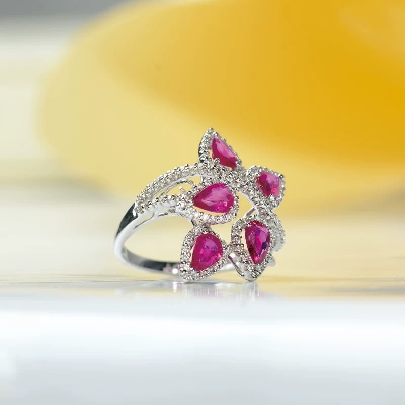 14k Gold 2.42 Ctw Natural Ruby & Diamond Ring: Ref:230948007 // gold content:14k gold // ring size:7. 25us // // main gemstone:ruby // shape:pear // carat weight:1. 98ct // color:red // treatment:natural // // adjacent gemstone 2 : diamond //