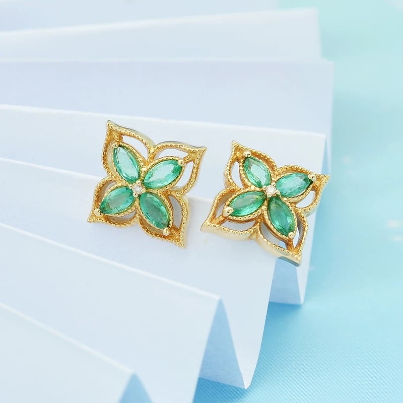 14k Gold 0.58 Ctw Natural Emerald & Diamond Earrings: Ref:230948080 // gold content:14k gold // main gemstone:emerald // shape:marquise // carat weight:0. 57ct // color:green // treatment:natural // // adjacent gemstone 2 : diamond // shape:round // cara
