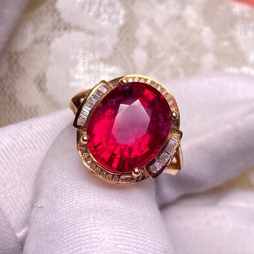 14k Gold 5.25 Ct Natural Tourmaline & Diamond Ring: Ref:230948110 // gold content:14k gold // ring size:7. 25us // // main gemstone:tourmaline // shape:oval // carat weight:5. 25ct // color:red // treatment:natural // // adjacent gemstone 2 :