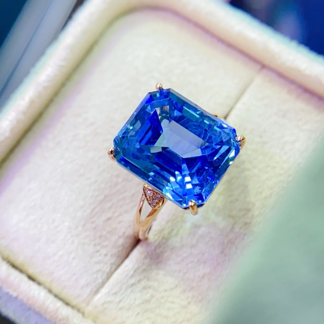 14k Gold 10.92 Ctw Natural Topaz & Diamond Ring: Ref:230948118 // gold content:14k gold // ring size:7. 25us // // main gemstone:topaz // shape:octagonal // carat weight:10. 9ct // color:blue // treatment:natural // // adjacent gemstone 2 : diamond