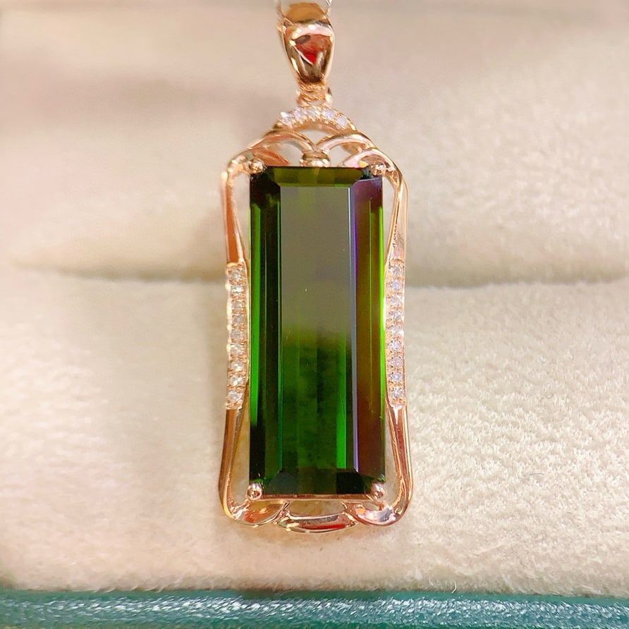 14k Gold 8.47 Ctw Natural Tourmaline & Diamond Pendant( Without Chain ): Ref:230948140 // gold content:14k gold // main gemstone:tourmaline // shape:octagonal // carat weight:8. 4ct // color:green // treatment:natural // // adjacent gemstone 2 : diamond // number of stones