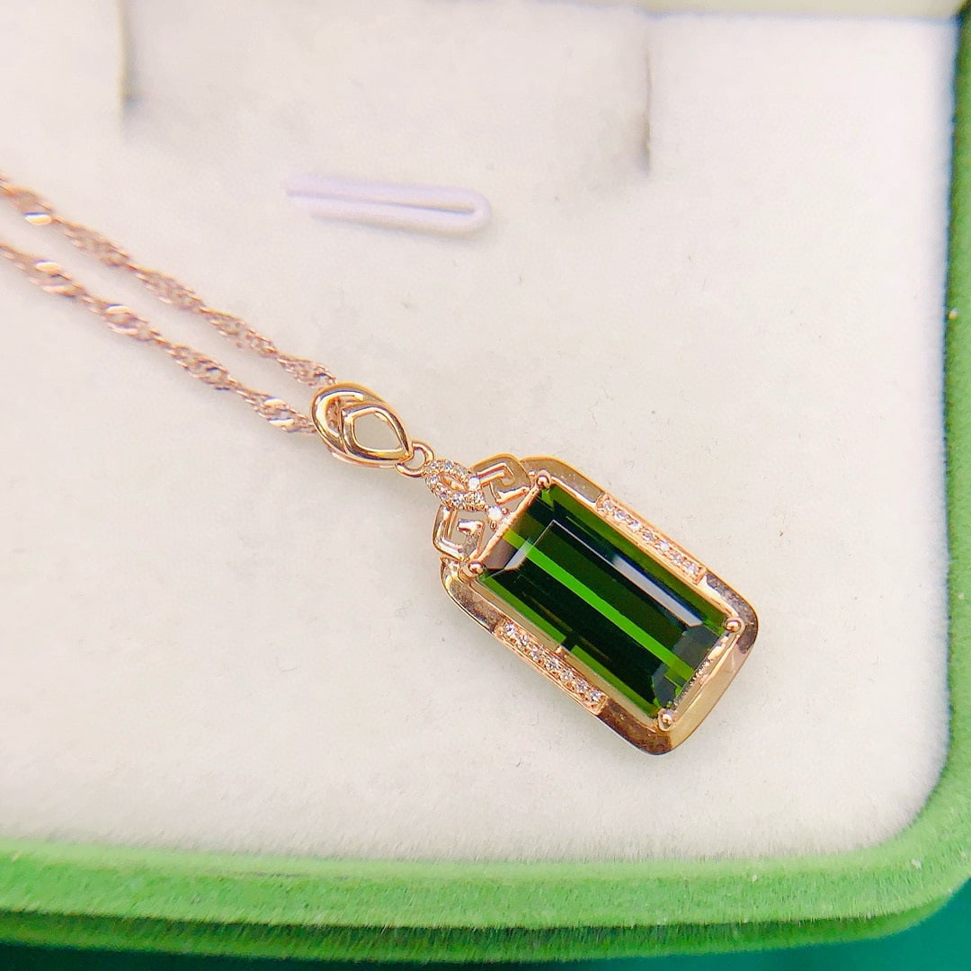 14k Gold 4.07 Ctw Natural Tourmaline & Diamond Pendant( Without Chain ): Ref:230948165 // gold content:14k gold // main gemstone:tourmaline // shape:octagonal // carat weight:4ct // color:green // treatment:natural // // adjacent gemstone 2 : diamond // number of stones:23