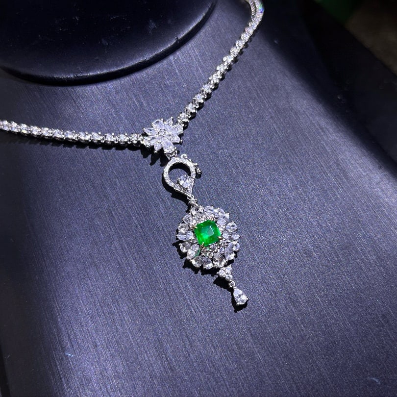 14k Gold 0.56 Ctw Vivid Green Natural Emerald & Diamond Pendant( Without Chain ): Ref:230948267 // gold content:14k gold // main gemstone:emerald // shape:octagonal // carat weight:0. 54ct // color:vivid green // treatment:natural // // adjacent gemstone 2 : diamond // shape:round