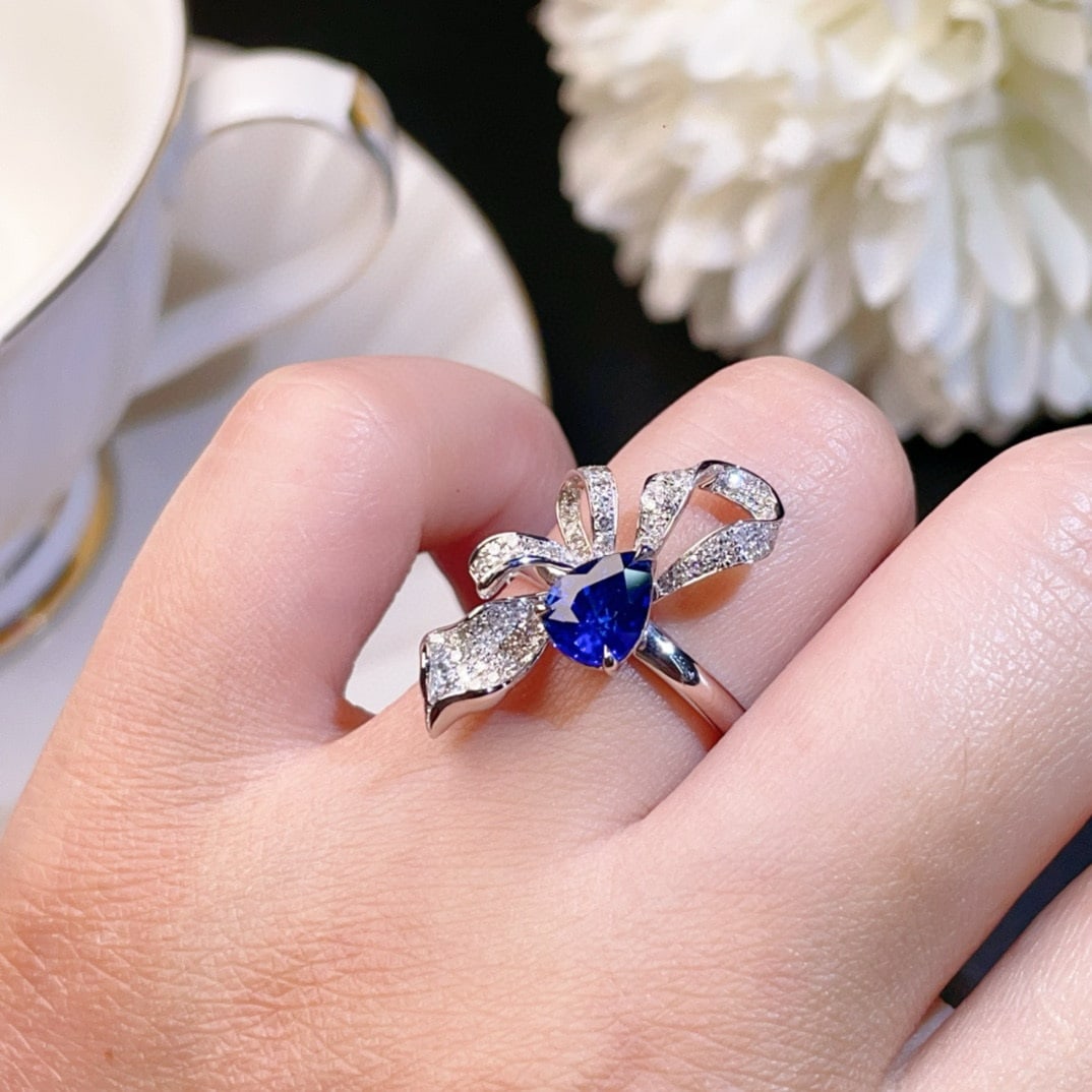 14k Gold 1.87 Ctw Vivid Blue Natural Sapphire & Diamond Ring: Ref:230948275 // gold content:14k gold // ring size:7. 25us // // main gemstone:sapphire // shape:pear // carat weight:1. 48ct // color:vivid blue // treatment:natural // // adjacent gemstone 2 : diam