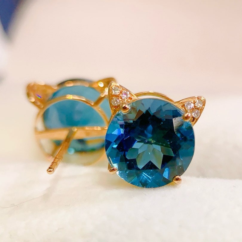 14k Gold 6.05 Ct Natural Topaz & Diamond Earrings: Ref:230948299 // gold content:14k gold // main gemstone:topaz // shape:round // carat weight:6. 05ct // color:blue // treatment:natural // cut grade:g // // adjacent gemstone 2 : diamond // number of