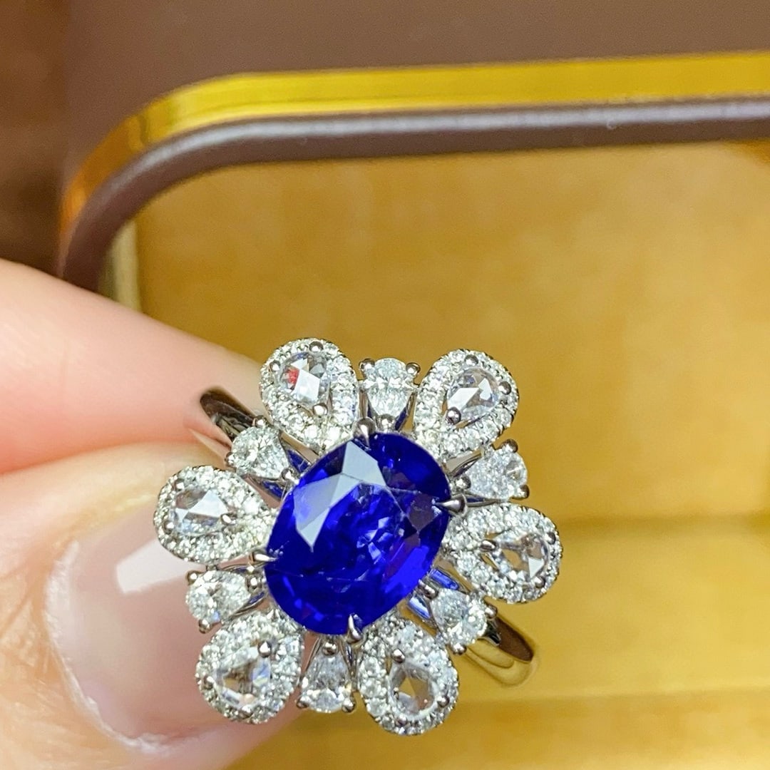 14k Gold 2.47 Ctw Vivid Blue Natural Sapphire & Diamond Ring: Ref:230948308 // gold content:14k gold // ring size:7. 25us // // main gemstone:sapphire // shape:oval // carat weight:1. 79ct // color:vivid blue // treatment:natural // // adjacent gemstone 2 : diam