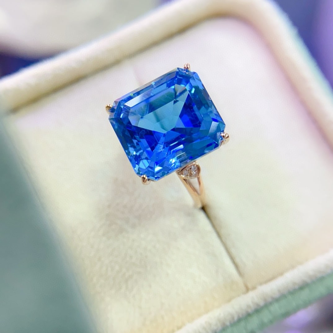 14k Gold 11.57 Ctw Natural Topaz & Diamond Ring: Ref:230948335 // gold content:14k gold // ring size:7. 25us // // main gemstone:topaz // shape:octagonal // carat weight:11. 55ct // color:swiss blue // treatment:natural // // adjacent gemstone 2 : d