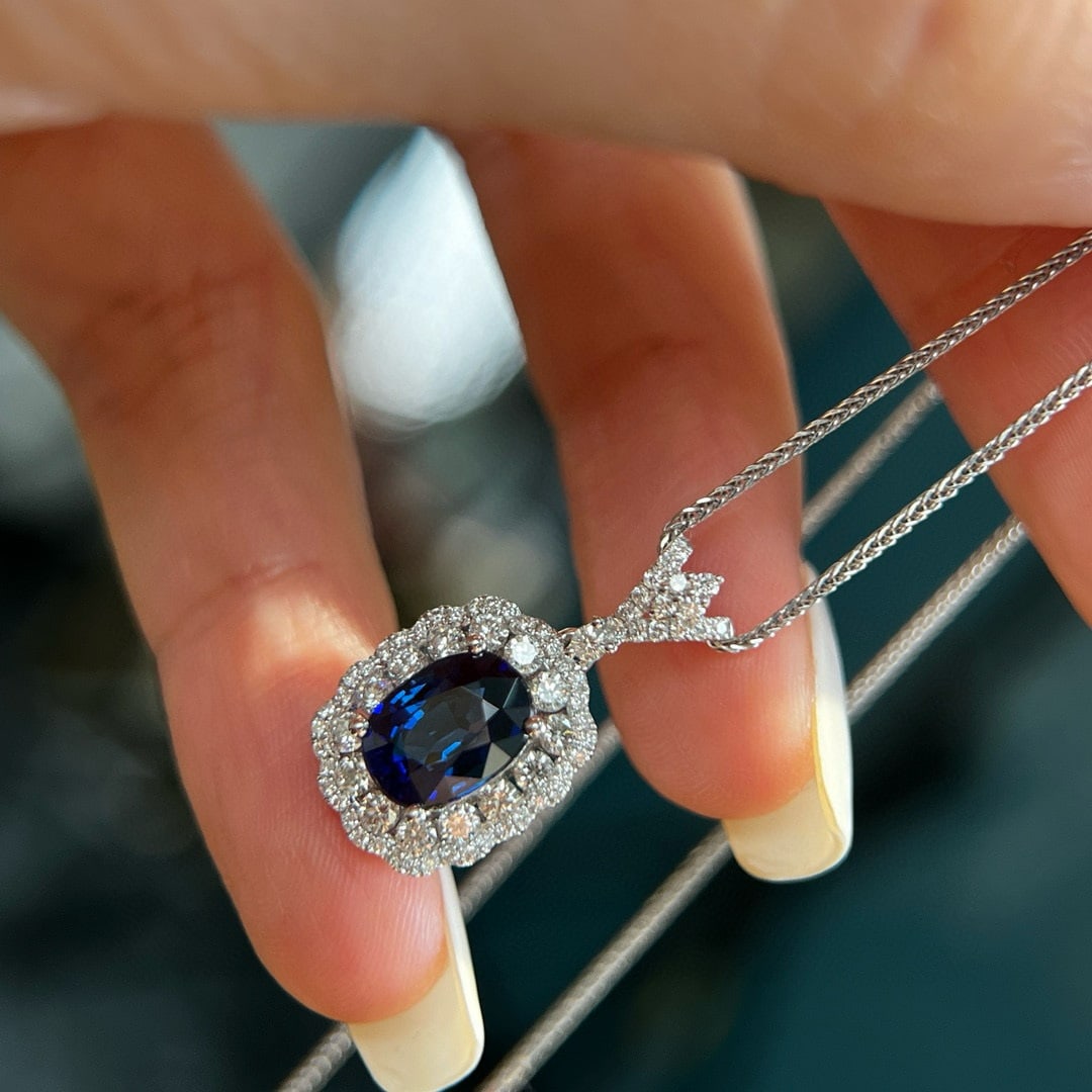 14k Gold 2.67 Ctw Natural Sapphire & Diamond Pendant( Without Chain ): Ref:230948395 // gold content:14k gold // main gemstone:sapphire // shape:oval // carat weight:2. 09ct // color:royal blue // treatment:natural // // adjacent gemstone 2 : diamond // shape:round //