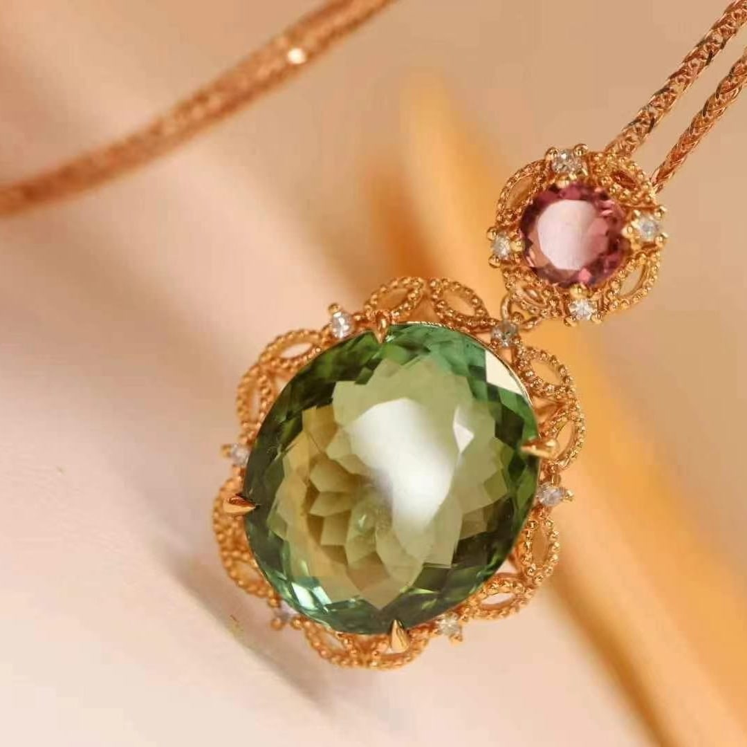 14k Gold 9.15 Ct Natural Tourmaline & Diamond Pendant( Without Chain ): Ref:230949019 // gold content:14k gold // main gemstone:tourmaline // shape:oval // carat weight:9. 15ct // color:green // treatment:natural // // adjacent gemstone 2 : diamond // shape:round //