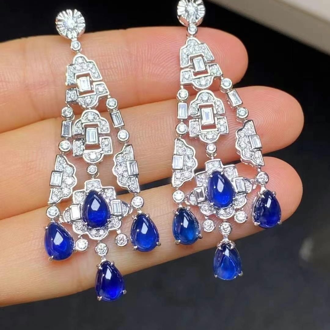14k Gold 10.39 Ctw Natural Sapphire & Diamond Earrings: Ref:230949020 // gold content:14k gold // main gemstone:sapphire // shape:pear // carat weight:8. 83ct // color:blue // treatment:natural // // adjacent gemstone 2 : diamond // shape:multiply // carat