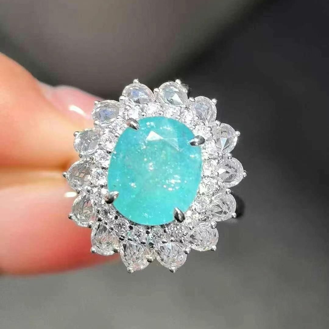 14k Gold 4.24 Ctw Natural Paraiba Tourmaline & Sapphire Ring/pendant( Without Chain ): Ref:230949030 // gold content:14k gold // ring size:7. 25us // // main gemstone:paraiba tourmaline // shape:oval // carat weight:2. 98ct // color:blue // treatment:natural // // adjacent gemstone 2 :