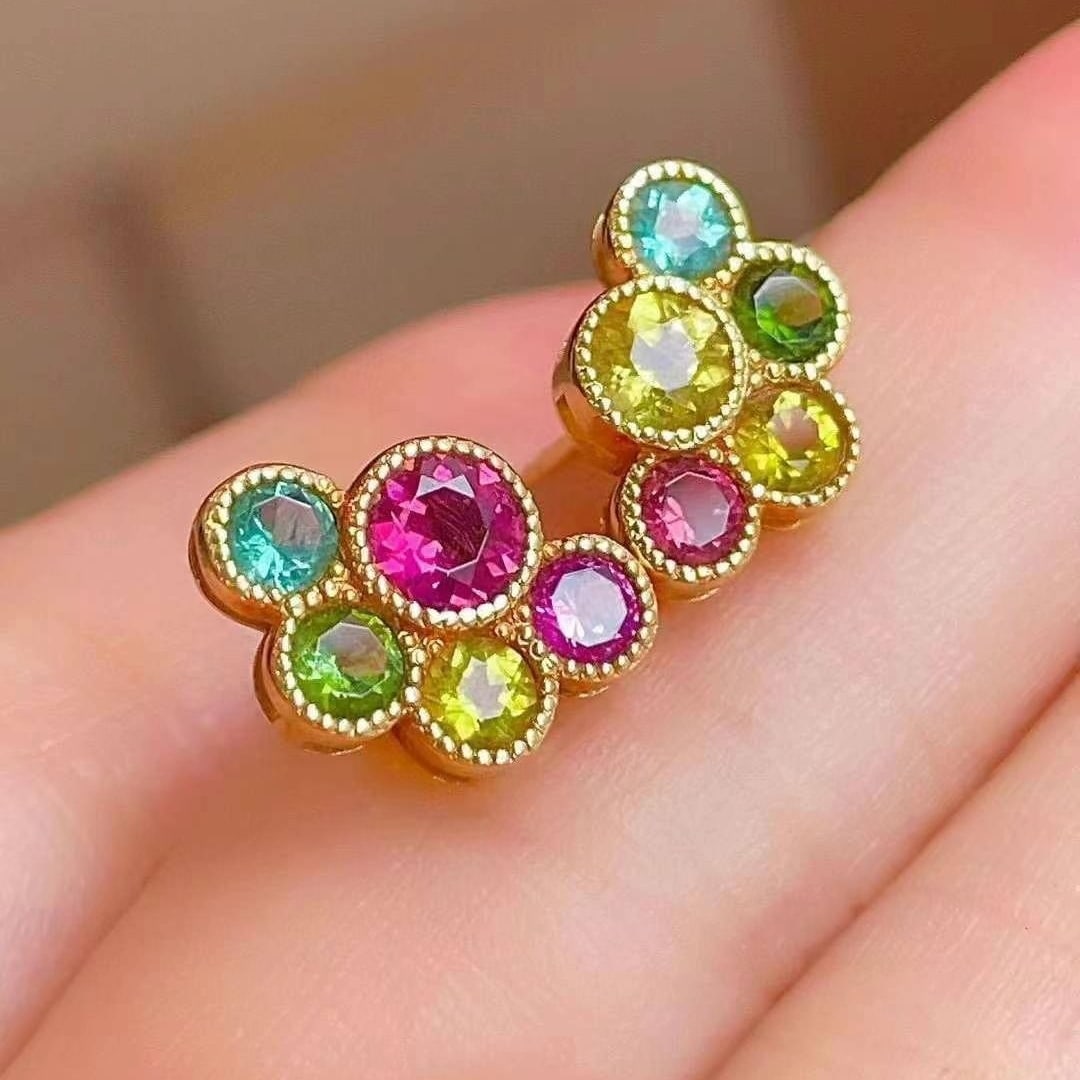 14k Gold 2.62 Ct Natural Tourmaline Earrings: Ref:230949035 // gold content:14k gold // main gemstone:tourmaline // shape:round // carat weight:2. 62ct // color:color // treatment:natural // cut grade:g // Condition: New Low Estimate: 2600.00 Hi