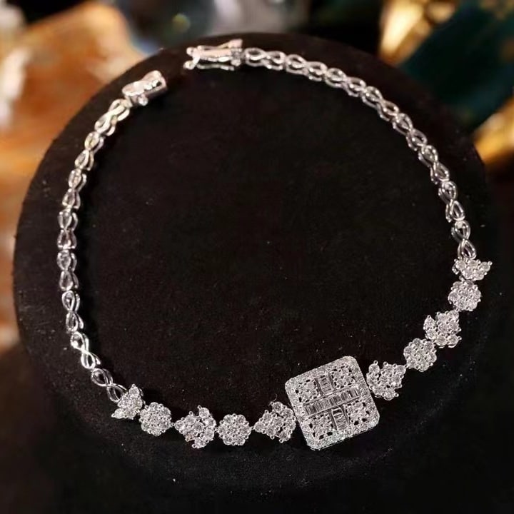 14k Gold 1.4 Ct Natural H Diamond Bracelet: Ref:230949077 // gold content:14k gold // main gemstone:diamond // shape:multiply // carat weight:1. 4ct // clarity grade:vs-si // color:h // treatment:natural // Condition: New Low Estimate: 9200.00