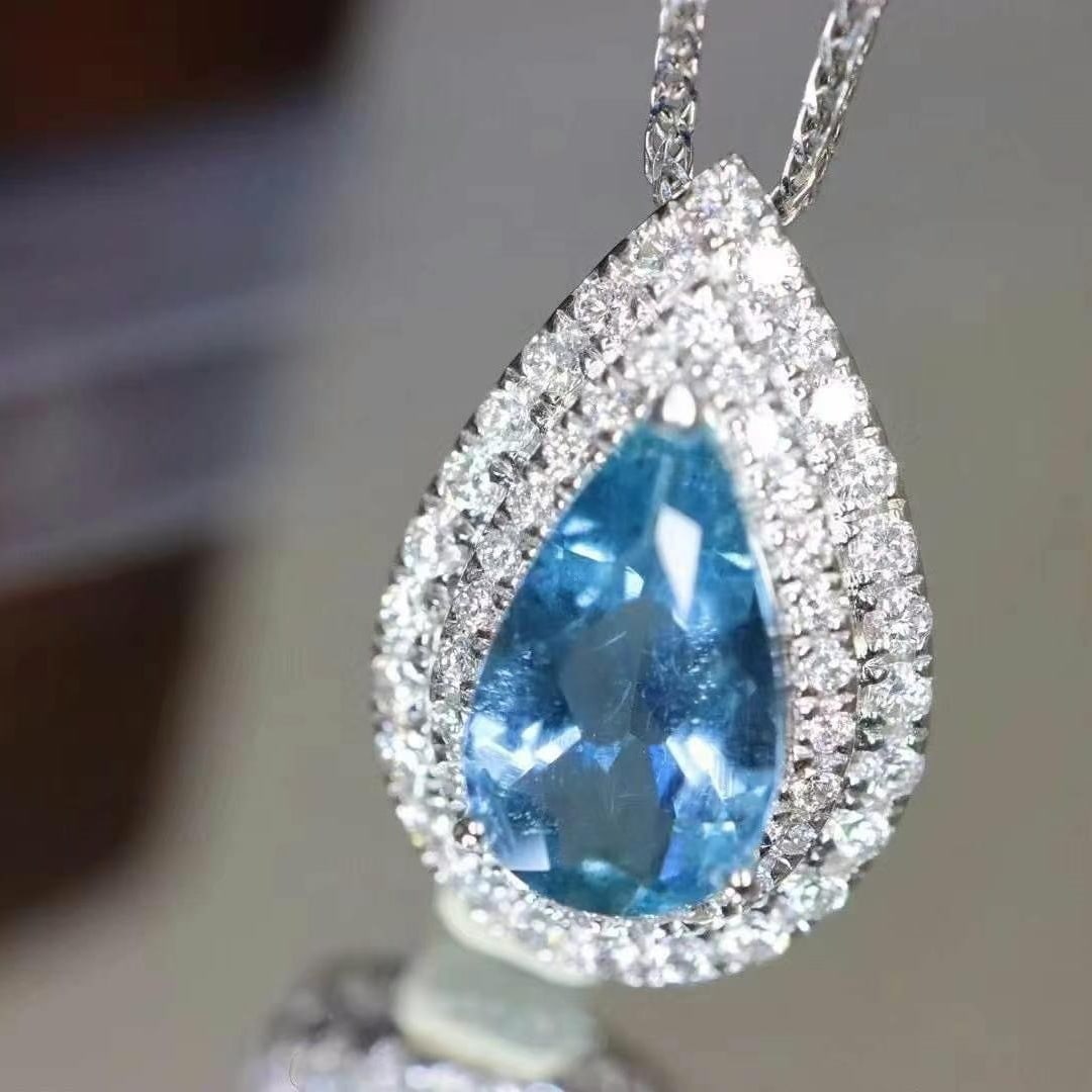 14k Gold 1.54 Ctw Natural Aquamarine & Diamond Pendant( Without Chain ): Ref:230949108 // gold content:14k gold // main gemstone:aquamarine // shape:pear // carat weight:1. 16ct // color:santa maria color // treatment:natural // // adjacent gemstone 2 : diamond // shape:ro