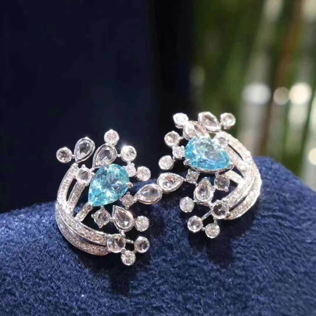 14k Gold 1.27 Ct Natural Paraiba Tourmaline & Diamond Earrings: Ref:230949199 // gold content:14k gold // main gemstone:paraiba tourmaline // shape:pear // carat weight:1. 27ct // color:blue // treatment:natural // // adjacent gemstone 2 : diamond // shape:round /