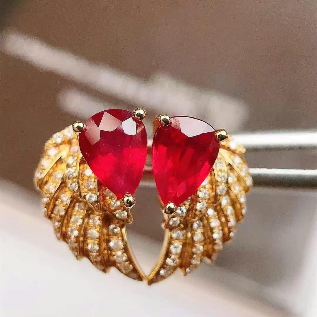 14k Gold 1.24 Ctw Natural Ruby & Diamond Earrings: Ref:230949228 // gold content:14k gold // main gemstone:ruby // shape:pear // carat weight:1. 13ct // color:pigeonblood red // treatment:natural // // adjacent gemstone 2 : diamond // shape:round