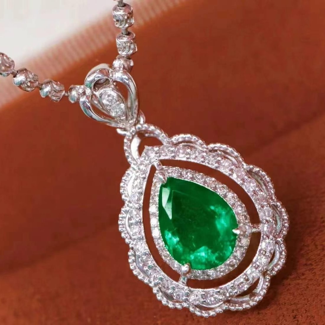 14k Gold 1.16 Ctw Vivid Green Natural Emerald & Diamond Pendant( Without Chain ): Ref:230949239 // gold content:14k gold // main gemstone:emerald // shape:pear // carat weight:0. 90ct // color:vivid green // treatment:natural // // adjacent gemstone 2 : diamond // shape:round //