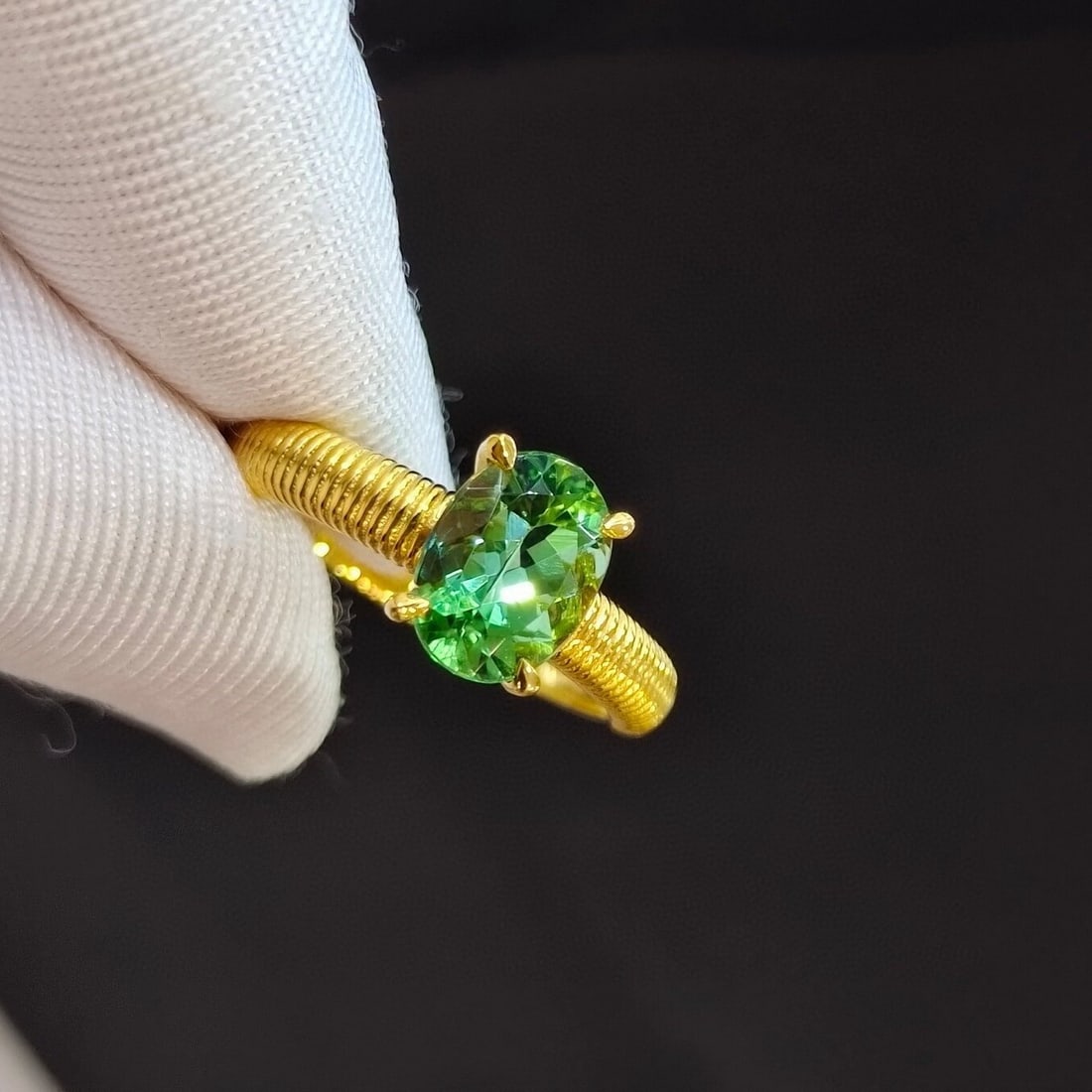 14k Gold 1.39 Ct Natural Tourmaline Ring: Ref:230950049 // gold content:14k gold // ring size:7. 25us // // main gemstone:tourmaline // shape:oval // carat weight:1. 39ct // color:green // treatment:natural // Condition: NewLow Estimate: