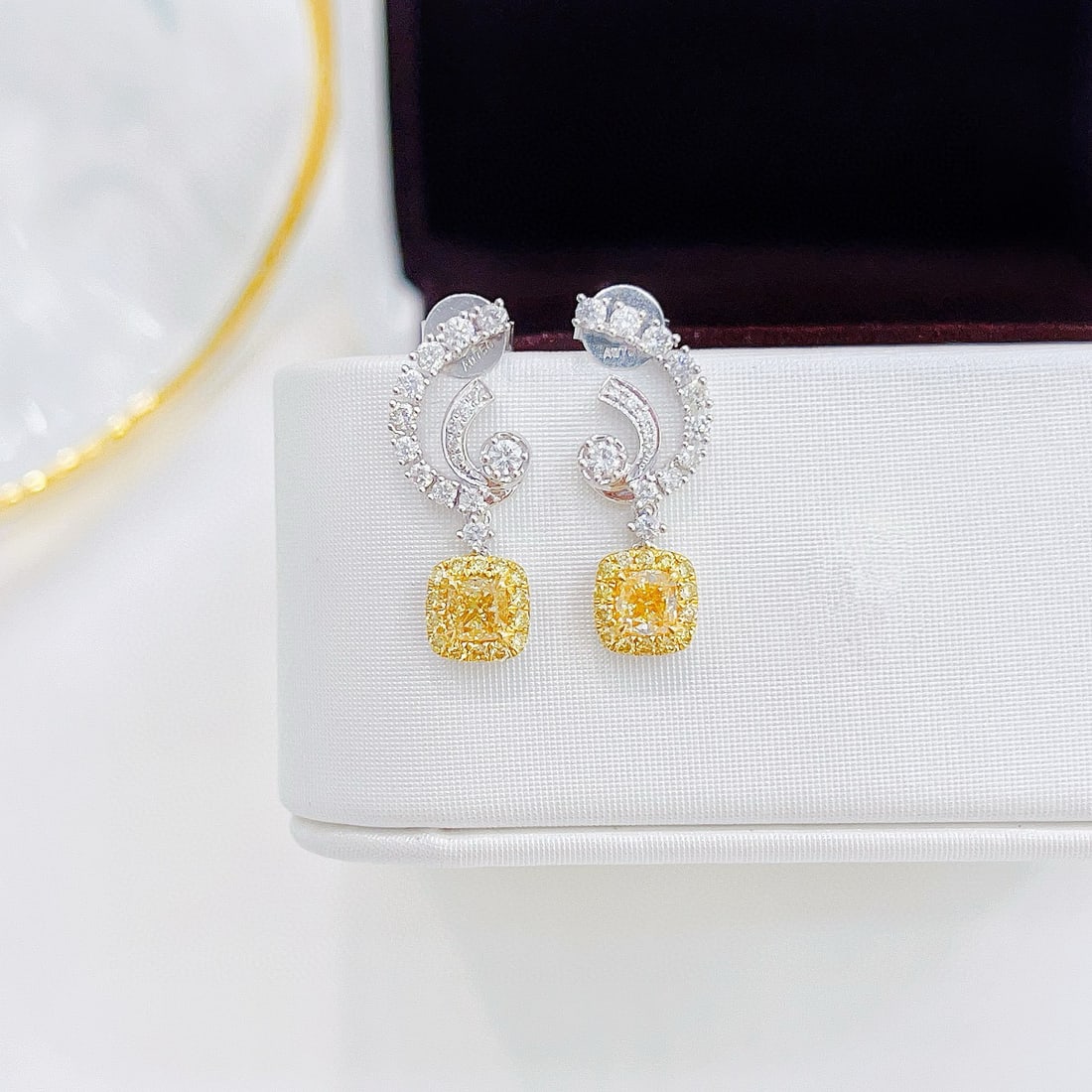 14k Gold 1.00 Ctw Natural Yellow Diamond & Diamond Earrings: Ref:230950174 // gold content:14k gold // main gemstone:yellow diamond // shape:cushion // carat weight:0. 54ct // color:yellow // treatment:natural // // adjacent gemstone 2 : diamond // shape:round
