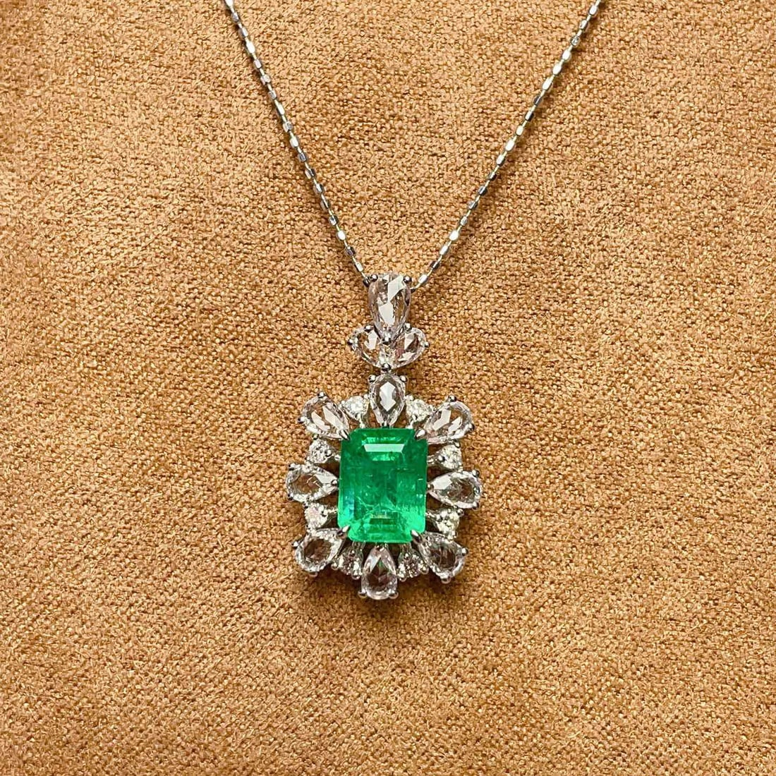 14k Gold 1.3 Ct Vivid Green Natural Emerald & Diamond & Sapphire Pendant( Without Chain ): Ref:230950300 // gold content:14k gold // main gemstone:emerald // shape:octagonal // carat weight:1. 3ct // color:vivid green // treatment:natural // // adjacent gemstone 2 : diamond // number of