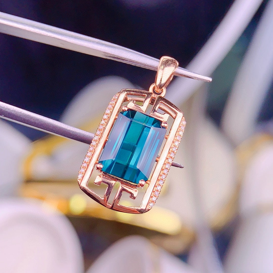14k Gold 3.5 Ct Natural Tourmaline & Diamond Pendant( Without Chain ): Ref:230950354 // gold content:14k gold // main gemstone:tourmaline // shape:octagonal // carat weight:3. 5ct // color:blue // treatment:natural // // adjacent gemstone 2 : diamond // shape:round //