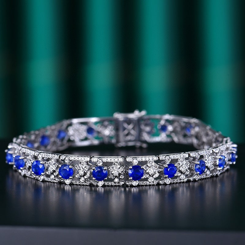 14k Gold 6.65 Ctw Natural Sapphire & Diamond Bracelet: Ref:230950412 // gold content:14k gold // main gemstone:sapphire // shape:round // carat weight:5. 4ct // color:royal blue // treatment:natural // cut grade:g // // adjacent gemstone 2 : diamond //