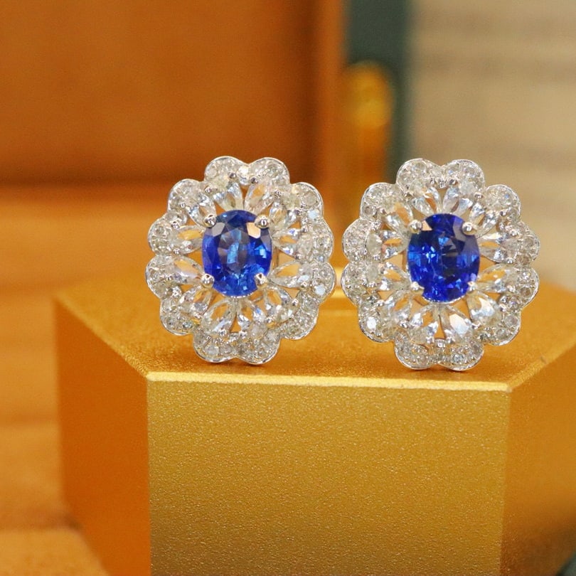 14k Gold 1.30 Ctw Natural Sapphire & Diamond Earrings: Ref:230950429 // gold content:14k gold // main gemstone:sapphire // shape:oval // carat weight:1. 10ct // color:blue // treatment:natural // // adjacent gemstone 2 : diamond // number of stones:68